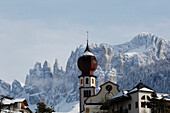Steeple in Tiers, with the mount Rosengarten  in the background, Dolomites, Alto Adige, South Tyrol, Italy