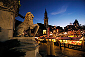 Christmas market in front of Bolzano cathedral in the evening, Bolzano, South Tyrol, Alto Adige, Italy, Europe