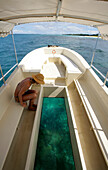 Woman on a glass bottom boat ride, Shoal Bay, Anguilla
