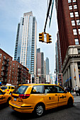 Yellow Taxis In The 6Th Avenue, Manhattan, New York, USA