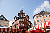 Market umbrellas and neighboring buildings, Marburg, Germany