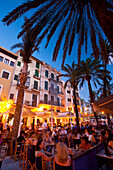 People In Cafes And Restaurants In Square With Palm Trees In The Evening, Palma, Majorca, Spain
