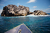 Boat and rocks off Cousine Island, Seychelles