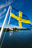 Swedish flag, Drottningholm Castle, Stockholm, Sweden.