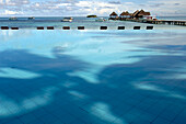 Maldives, stilted houses, pool at foreground