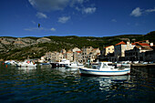 Komiza, Vis, Croatia. Fishing boats sitting in the harbour of Komiza Town.