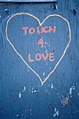 Touch for Love heart  graffiti on a wall, Copenhagen, Christiana, Copenhagen, Denmark