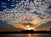 Clouds and sky at sunset over the Nile river, Aswan, Egypt