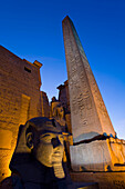 Large pharaoh's head statue and obelisk, Luxor Temple, Luxor, Egypt