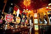 Cask Ale Taps, On The Bar. Interior Of The Viaduct, Public House/Pub, Newgate Street, London, Uk