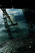 Millenium wheel, reflection in puddle, london eye, southbank, London, England.