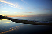 Infinity pool and sea at dusk, Los Cabos, Baja California Sur, Mexico