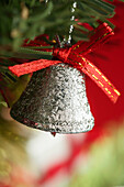 Christmas presents macro photo: glitter silver bell