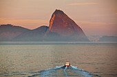 Pilot boat and Pao de Acucar, Sugar Loaf, Mountain at sunrise, seen from cruise ship MS Deutschland, Reederei Peter Deilmann, Rio de Janeiro, Rio de Janeiro, Brazil, South America