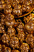 Brass tea pots on display in the souks of Marrakesh, Marrakesh, Morocco