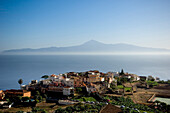 The town of Agulo with the Island of Tenerife in the background, Agulo, Island of La Gomera, Canary Islands. Spain