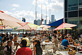 People at outdoors tables at Navy Pier, Chicago, Illinois, USA