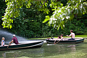 People boating in Central Park, Manhattan, New York City, USA