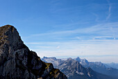 View across the Wetterstein Mountains and Alpine foothills from the Westliche Karwendelspitze, Karwendel National Park, Mittenwald, Bavaria, Germany