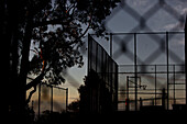 Public basketball court at dusk, San Francisco, California, USA