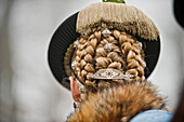 Woman with plaited hair, Leonhardi procession, Bad Toelz, Upper Bavaria, Bavaria, Germany