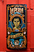 Italian La Perla Vinoteca sign in Caminito, La Boca, Buenos Aires, Argentina