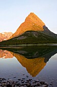 Mountain Grinnell Sunrise Reflection in Swiftcurrent Lake Glacier National Park