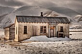 Abandoned farm house, Oteake Conservation Area, near Hawkdun range, Central Otago, New Zealand