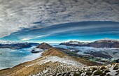 Morning cloud covers Lake Coleridge  left and Rakaia river right, Mt Hutt right, panorama from Mt Oakden above Peak hill Station, Canterbury high country