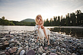 Barbie Doll on Toy Horse Next to River, Montana, USA