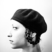 Woman With Braided Hair Wearing Beret, Profile