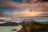 Windcloud over Cuernos del Paine at dawn, Lago Pehoe, Parque Nacional Torres del Paine, Patagonia, Chile