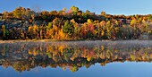 Autumn reflections in Gryphon Lake Espanola Ontario