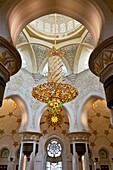 Interior architecture with chandelier in the Sheikh Zayed Grand Mosque in Abu Dhabi, UAE
