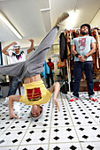 Breakdancer of UBUNTU with designer Craig Native at his studio in Long Street, City Centre, Cape Town, South Africa, Africa
