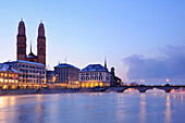 Grossmuenster church with river Limmat in foreground, Zurich, Switzerland