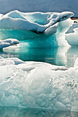 Colour changes to ice on the Jokulsarlon glacier lake, Iceland, Scandinavia, Europe