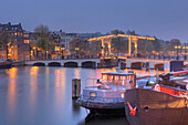Magere Brug with Binnenamstel at dusk, Amsterdam, North Holland, The Netherlands