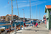 People at the harbour of Smogen, Smogen, Bohuslan, Vastra Gotalands lan, Sweden, Europe