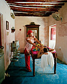 Therapist Acha giving a massage at Mrembo Spa,  Mrembo means beautiful woman, old house in the center of Stone Town, Zanzibar, Tanzania, East Africa