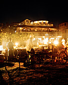 Food stalls at night on Forodhani beach, Africa House und Bar in the back, Stone Town, Zanzibar, Tanzania, East Africa