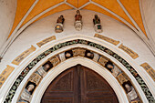 Figurative decoration on the portal of the church of St. Joduk, Landshut, Lower Bavaria, Bavaria, Germany, Europe