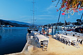 Lazarakis restaurant at harbour in the evening, Kastelorizo Megiste, Dodecanese Islands, Greece, Europe