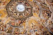 Inner surface of the Florence Duomo (Santa Maria del Fiore) with the great fresco of the last judgment by Giorgio Vasari. Painted between 1572 and 1578. Florence. Italy.