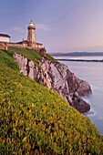 Lighthouse in twilight, Aviles, Bay of Biscay, Asturias, Spain