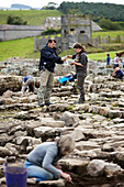 Andrew Birley head of the Archaeological excavation Vindolanda with volunteers, The Roman Vindolanda Fort, World Heritage Site, Bardon Mill, Hexham, Northumberland, England, Great Britain, Europe