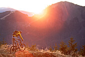 Mountainbiker riding on a trail in the Alps, Alpspitz, Bavaria, Germany, Europe