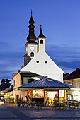 Illuminated church in the evening, Gmuend, Lower Austria, Austria, Europe