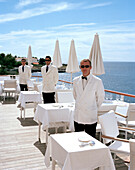 Waiters at the Eden-Roc Restaurant terrace, Hotel du Cap-Eden-Roc Boulevard JF Kennedy, BP 29, 06601 Antibes Cedex, Cote d'Azur, France, Europe