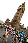 Runners near Big Ben at the London Marathon, London, England, Great Britain